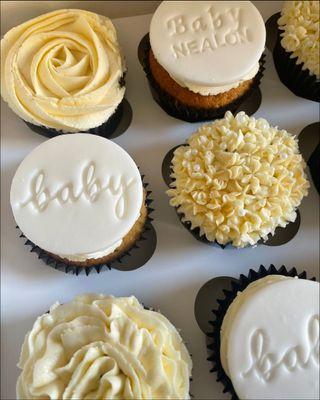 A box of baby
shower themed cupcakes